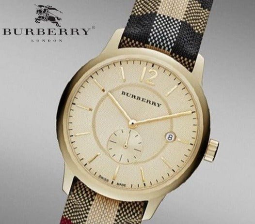 Burberry The Classic Round Gold Dial Brown Leather Strap Unisex Watch  - BU10001